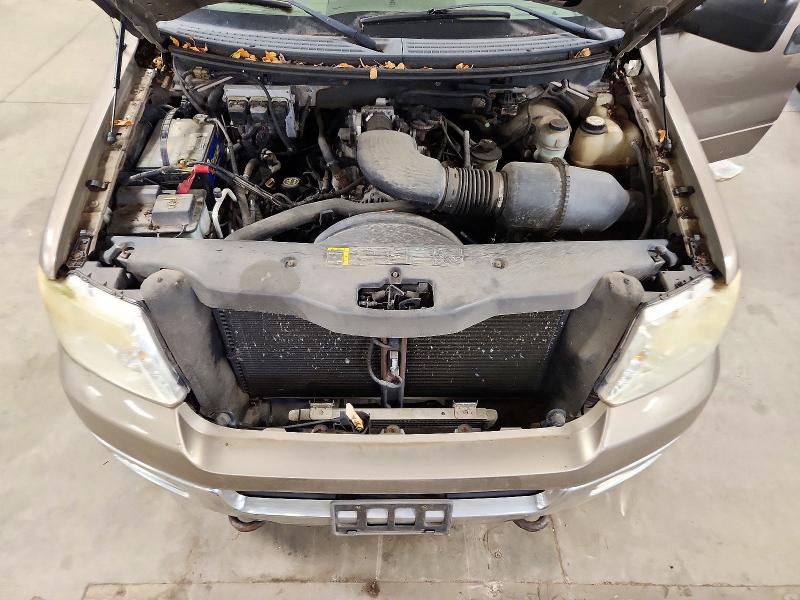 Снимка 11 от търг – 2004 FORD F150 с VIN 1FTRW14W04KB94369
