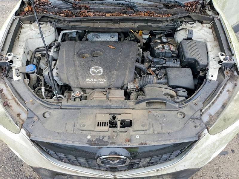 Снимка 12 от търг – 2014 MAZDA CX-5 с VIN JM3KE2DYXE0409093