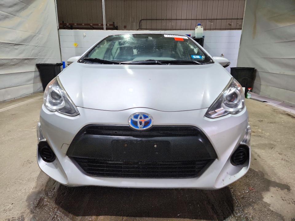 Снимка 5 от търг – 2015 TOYOTA PRIUS C с VIN JTDKDTB33F1586198