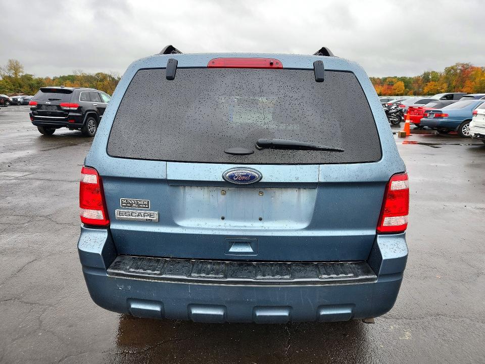 Снимка 6 от търг – 2011 FORD ESCAPE XLT с VIN 1FMCU9D79BKC58355
