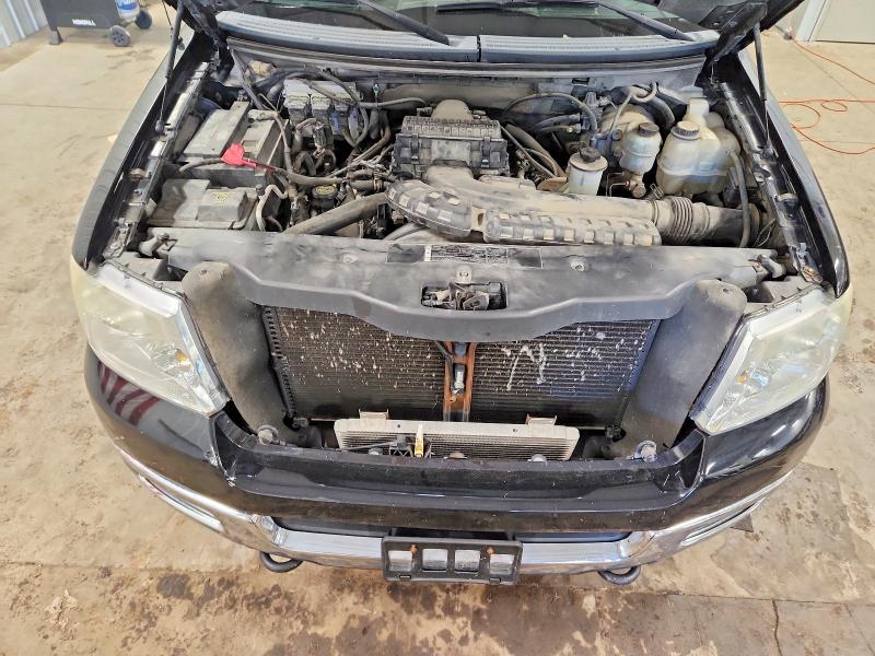 Photo 11 from auction – 2005 FORD F150 with VIN 1FTPX14595NA85534
