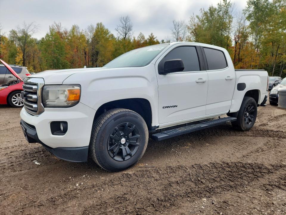 GMC CANYON 2016 с VIN 1GTG5CEAXG1177243 - Снимка от търг