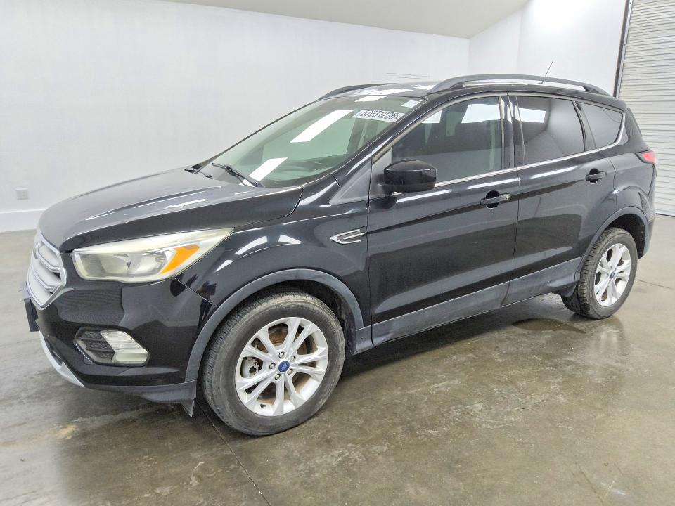 Photo 1 from auction – 2018 FORD ESCAPE with VIN 1FMCU9GD9JUC40135