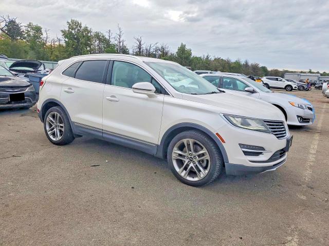 Photo 4 from auction – 2015 LINCOLN MKC with VIN 5LMTJ2AH5FUJ42056