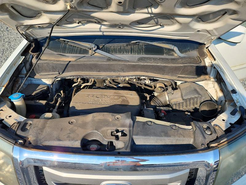 Снимка 12 от търг – 2011 HONDA PILOT с VIN 5FNYF4H54BB085616
