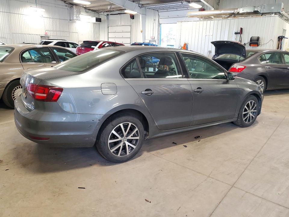 Снимка 3 от търг – 2017 VOLKSWAGEN JETTA с VIN 3VWDB7AJ9HM286688