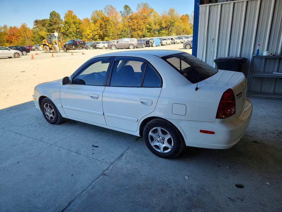 Photo 2 from auction – 2004 HYUNDAI ACCENT with VIN KMHCG45C84U567604