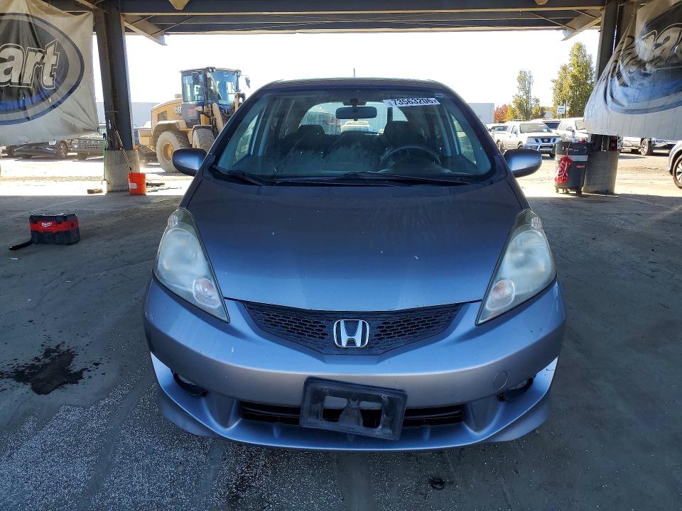 Снимка 5 от търг – 2009 HONDA FIT с VIN JHMGE88429S065471