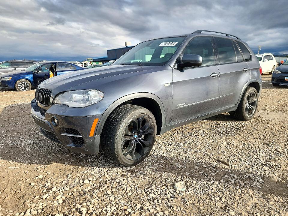 BMW X5 2013 с VIN 5UXZV8C59D0C15558 - Снимка от търг