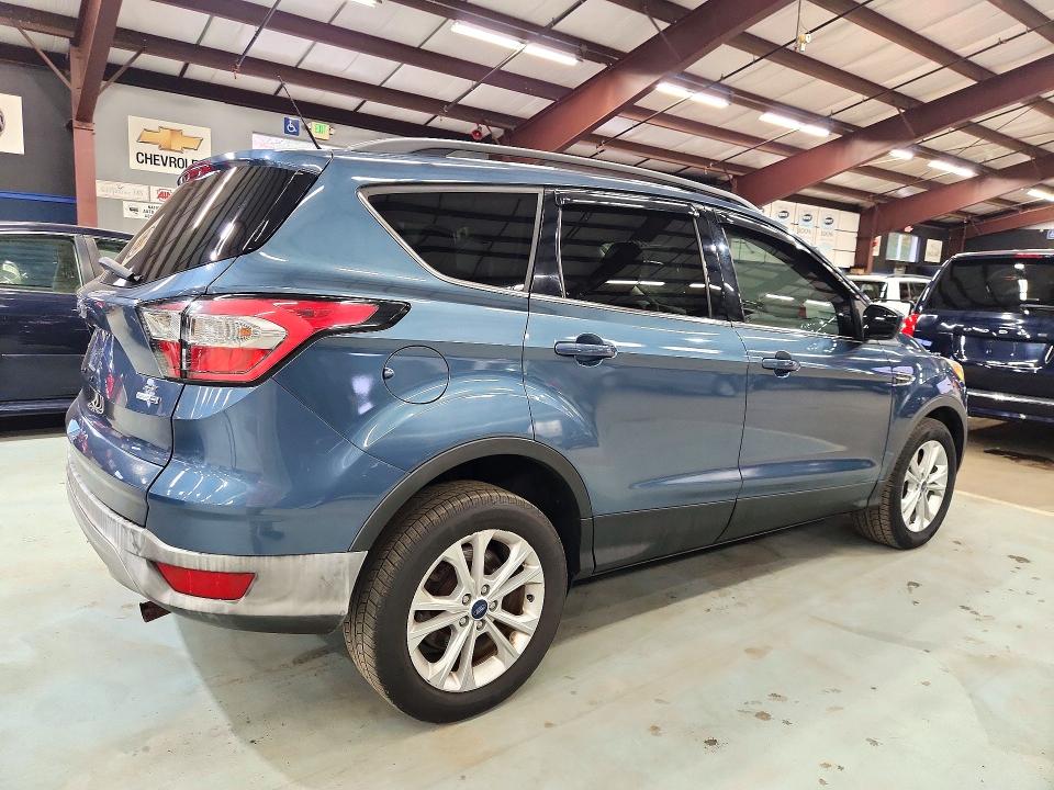 Photo 3 from auction – 2018 FORD ESCAPE with VIN 1FMCU9GD4JUA58214
