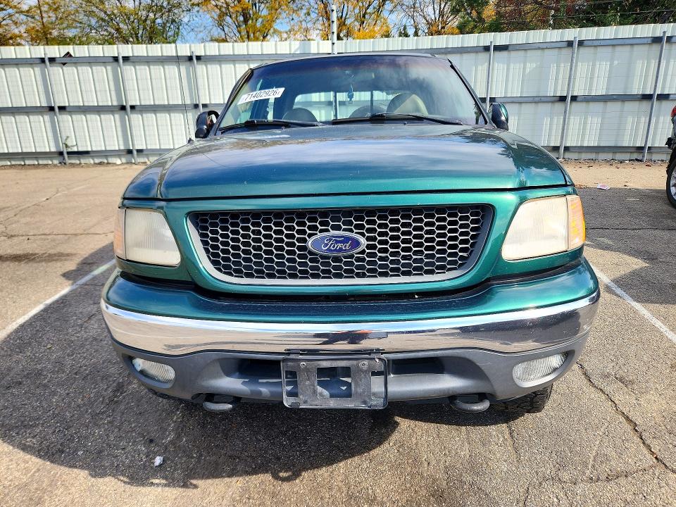 Снимка 5 от търг – 2001 FORD F150 с VIN 1FTRW08L41KE34562