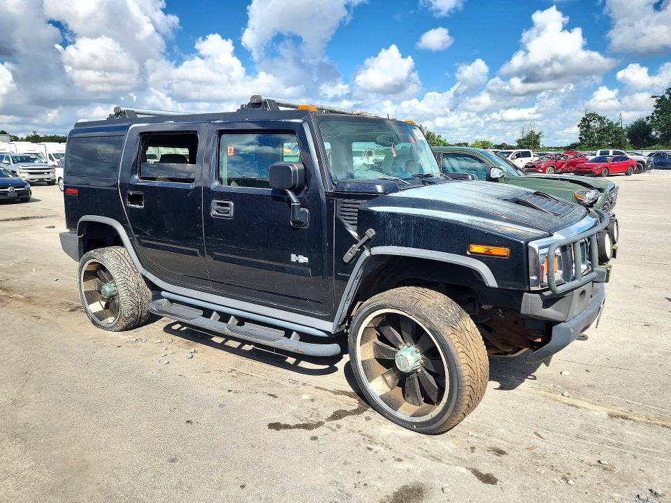 Фото 4 с аукциона – 2003 HUMMER H2 с VIN 5GRGN23UX3H101352