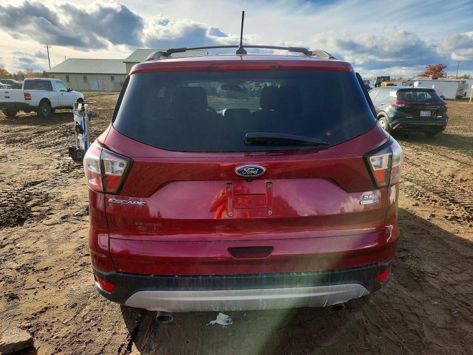Photo 6 from auction – 2018 FORD ESCAPE with VIN 1FMCU9GD3JUA36057