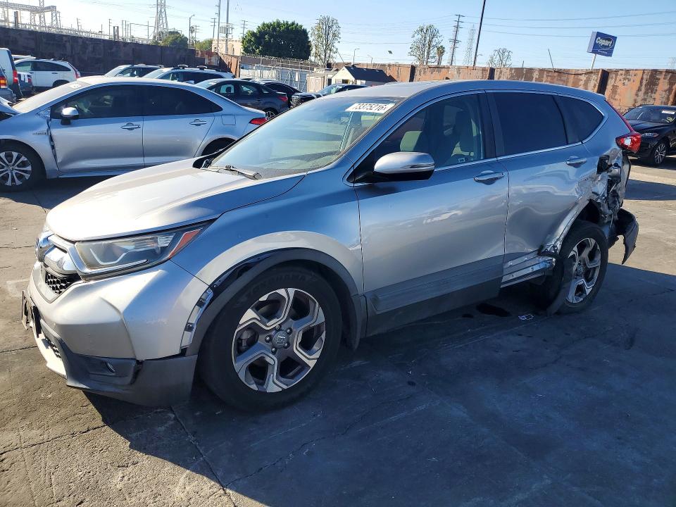 HONDA CR-V 2017 with VIN 7FARW1H57HE011736 - Photo from auction