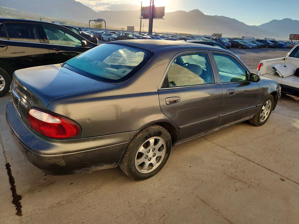 Снимка 3 от търг – 2001 MAZDA 626 с VIN 1YVGF22C115242164