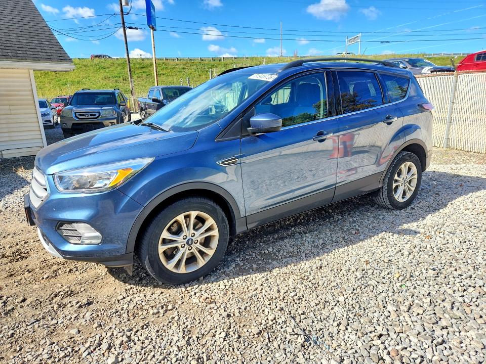 FORD ESCAPE 2018 z numerem VIN 1FMCU9GD4JUC29303 - Zdjęcie z aukcji