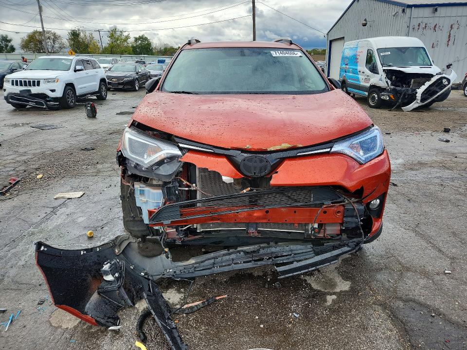 Photo 5 from auction – 2016 TOYOTA RAV4 with VIN JTMBFREV9GJ059116