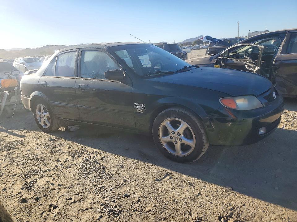 Снимка 4 от търг – 2001 MAZDA PROTEGE с VIN JM1BJ226X10406582