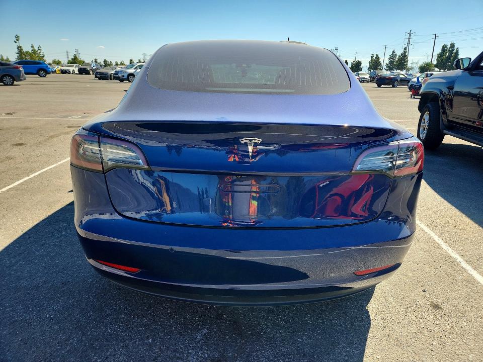 Снимка 6 от търг – 2018 TESLA MODEL 3 с VIN 5YJ3E1EA3JF155912