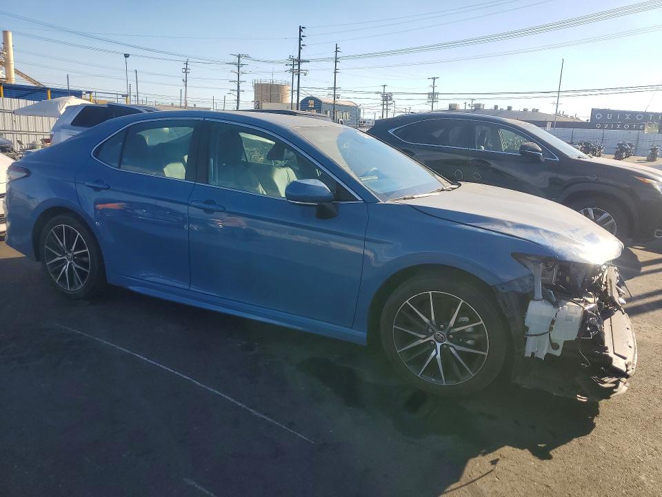 Снимка 4 от търг – 2023 TOYOTA CAMRY HYBRID с VIN 4T1G31AK2PU049727