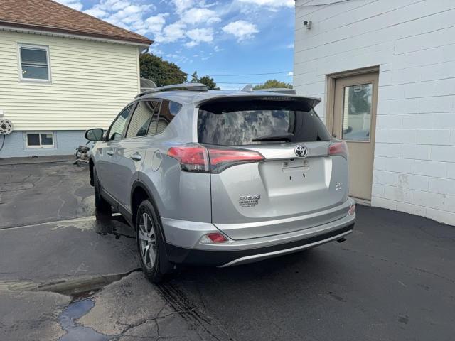 Photo 3 from auction – 2017 TOYOTA RAV4 with VIN 2T3RFREVXHW580170