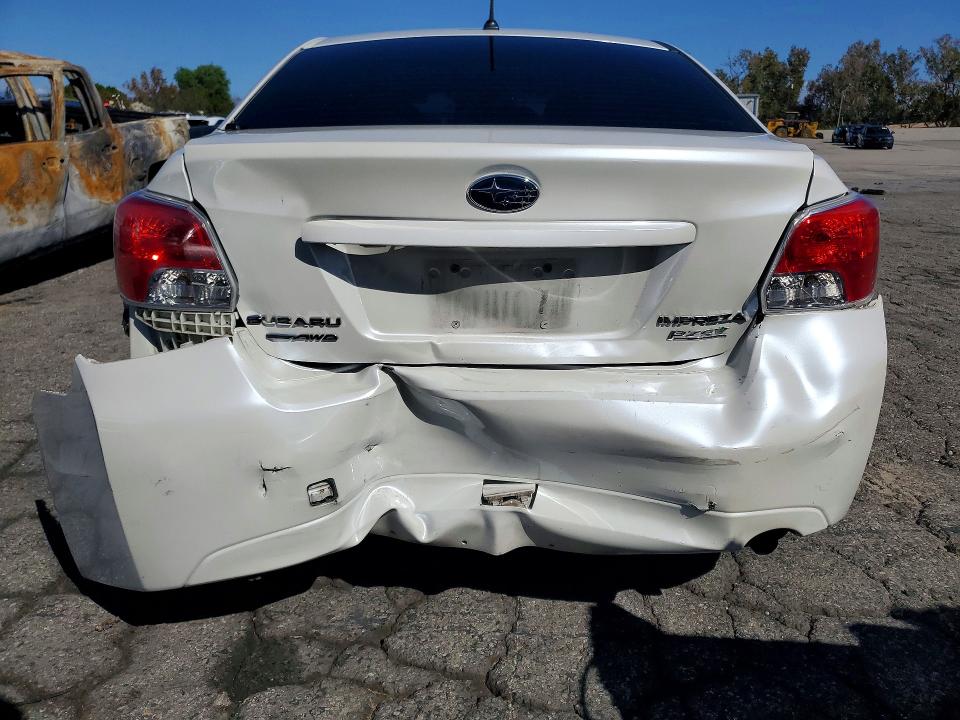 Снимка 6 от търг – 2014 SUBARU IMPREZA с VIN JF1GJAC68EH025499