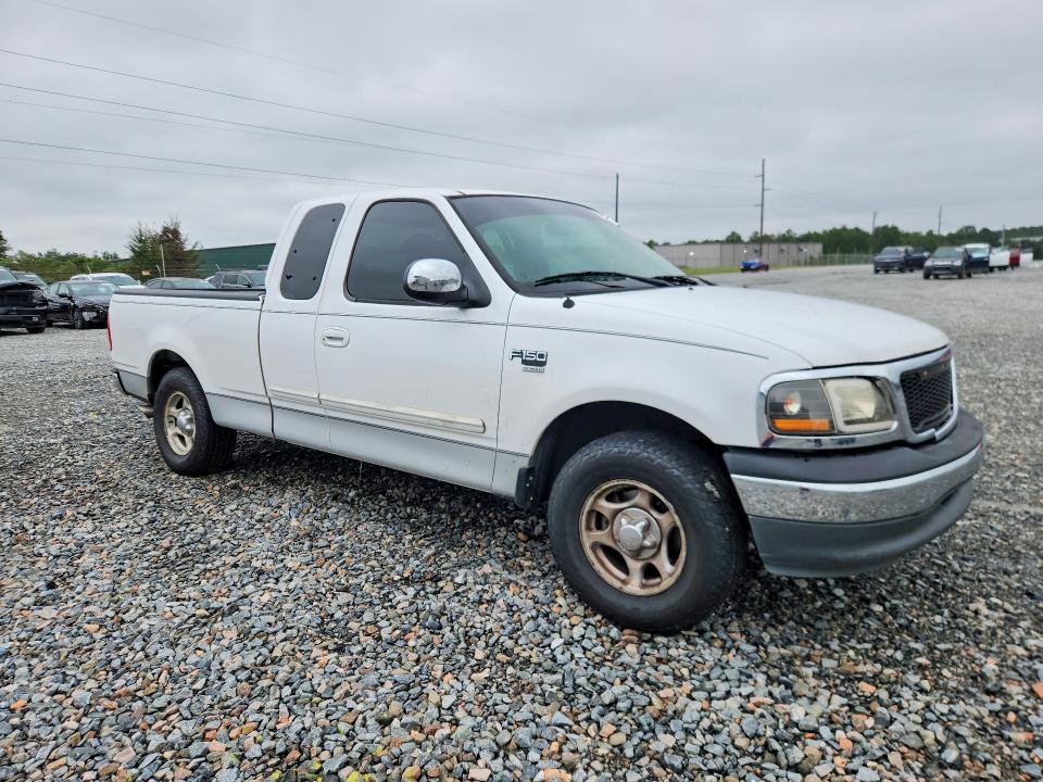 Снимка 4 от търг – 2001 FORD F150 с VIN 1FTRX17L61KF03773