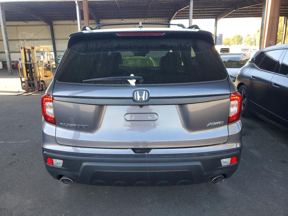 Снимка 6 от търг – 2021 HONDA PASSPORT с VIN 5FNYF8H59MB021680