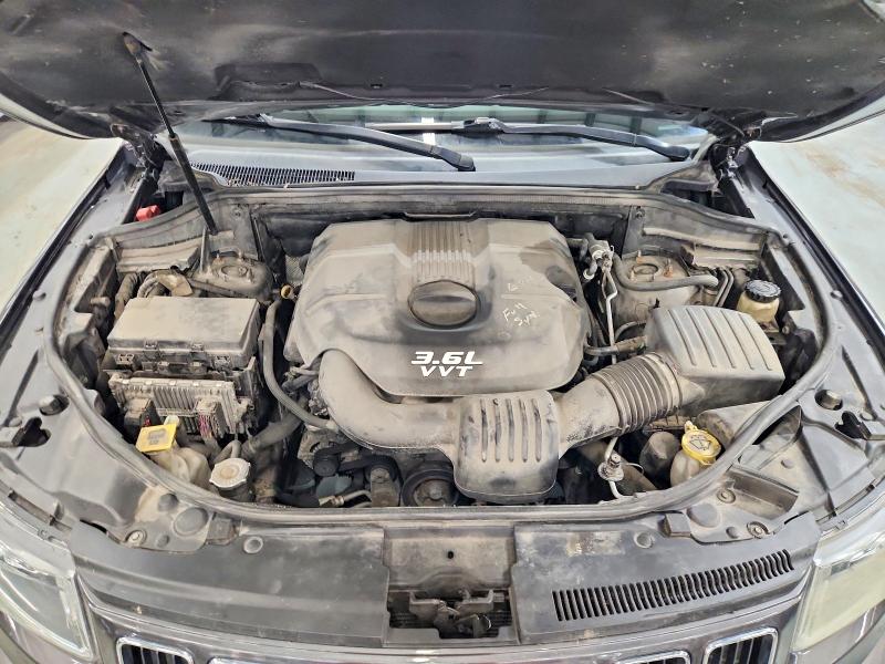 Photo 12 from auction – 2014 JEEP GRAND CHEROKEE with VIN 1C4RJFAGXEC135334