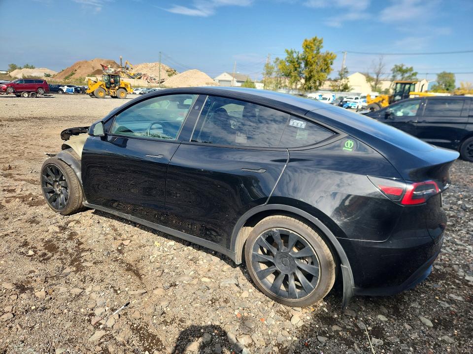 Photo 2 from auction – 2023 TESLA MODEL Y with VIN 7SAYGAEE2PF921238