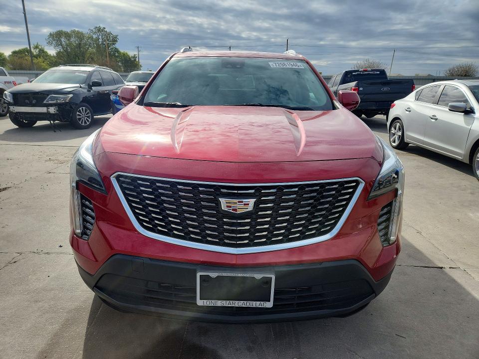 Foto 5 de la subasta – 2022 CADILLAC XT4 con VIN 1GYAZAR47NF154550