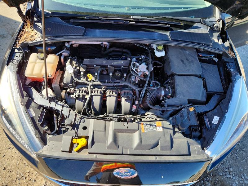 Снимка 11 от търг – 2017 FORD FOCUS с VIN 1FADP3F29HL327830