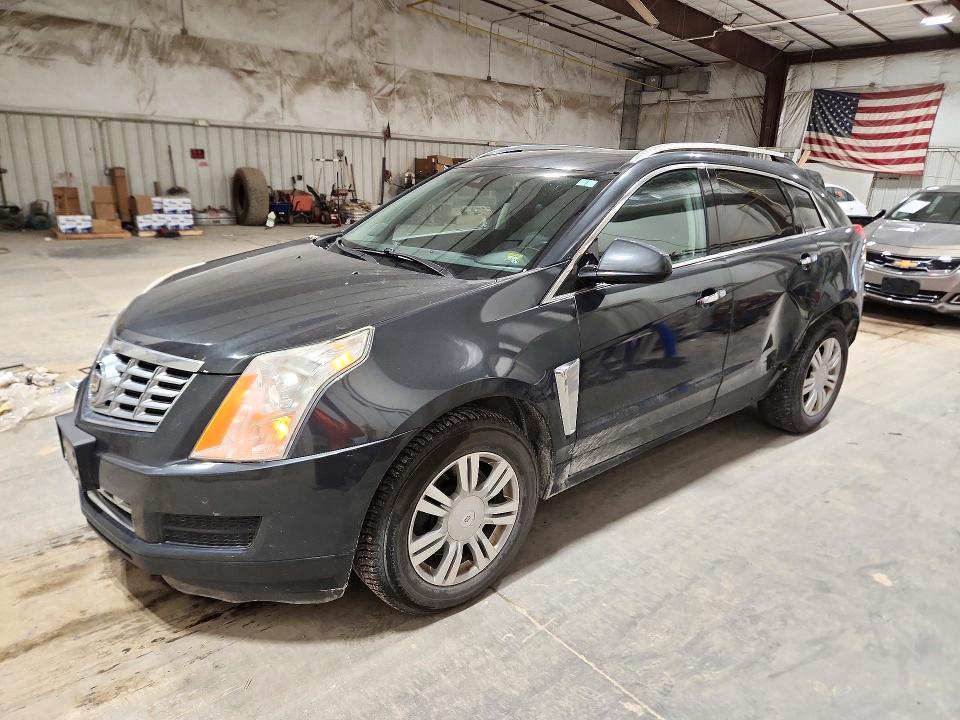 CADILLAC SRX 2014 с VIN 3GYFNEE31ES631975 - Снимка от търг
