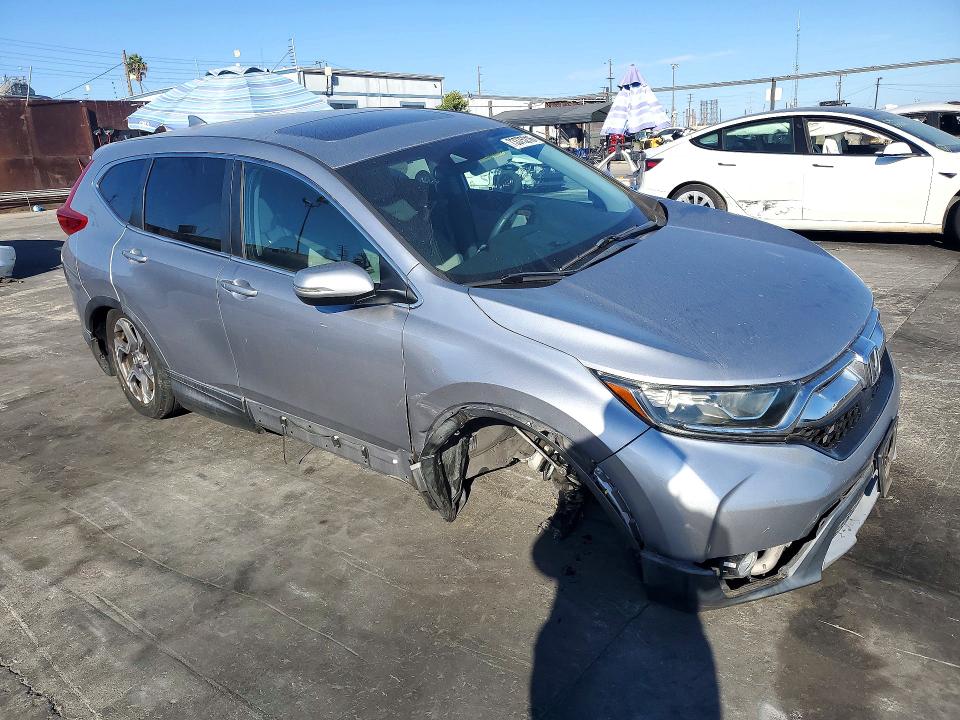 Photo 4 from auction – 2017 HONDA CR-V with VIN 7FARW1H57HE011736