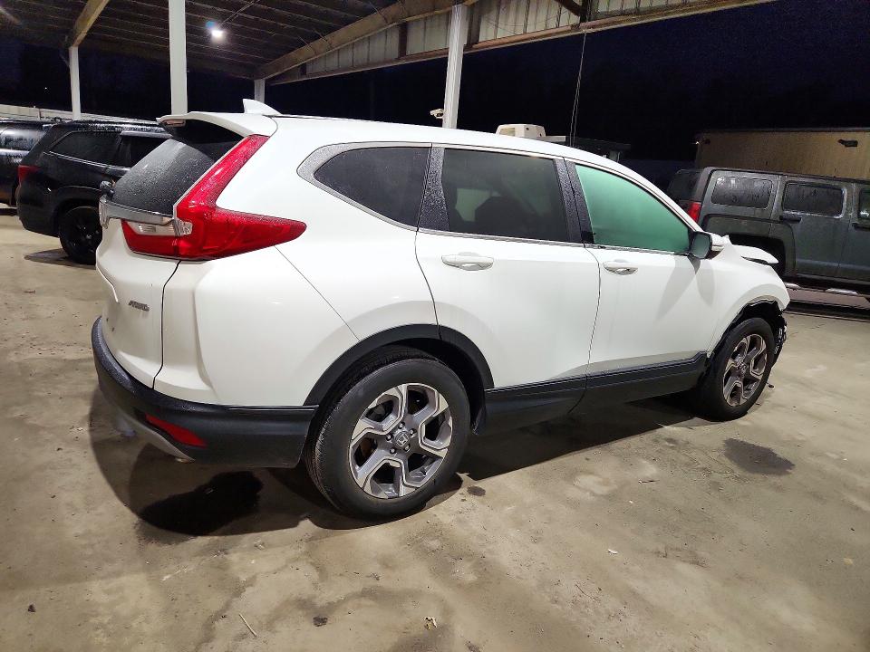 Photo 3 from auction – 2019 HONDA CR-V with VIN 7FARW2H5XKE041410