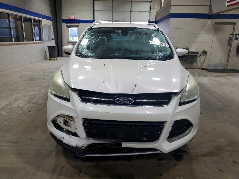 Photo 5 from auction – 2015 FORD ESCAPE with VIN 1FMCU0J98FUA88131