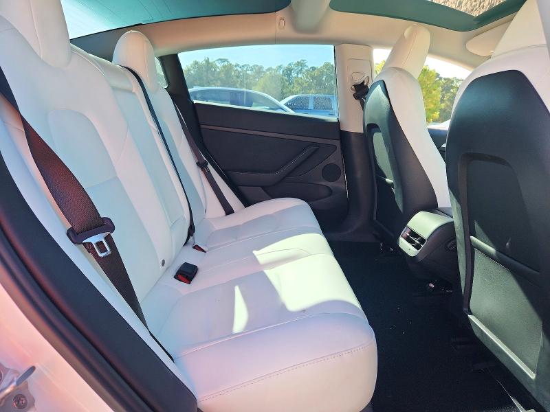 Снимка 10 от търг – 2023 TESLA MODEL 3 с VIN 5YJ3E1EA2PF653561