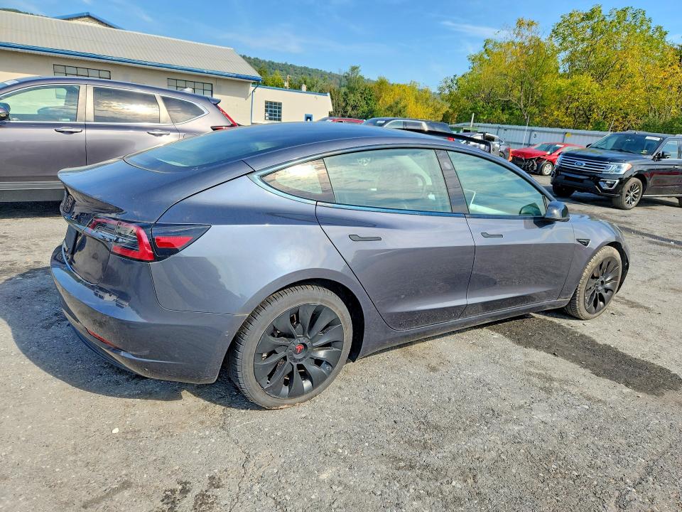 Снимка 3 от търг – 2021 TESLA MODEL 3 с VIN 5YJ3E1EA1MF026815