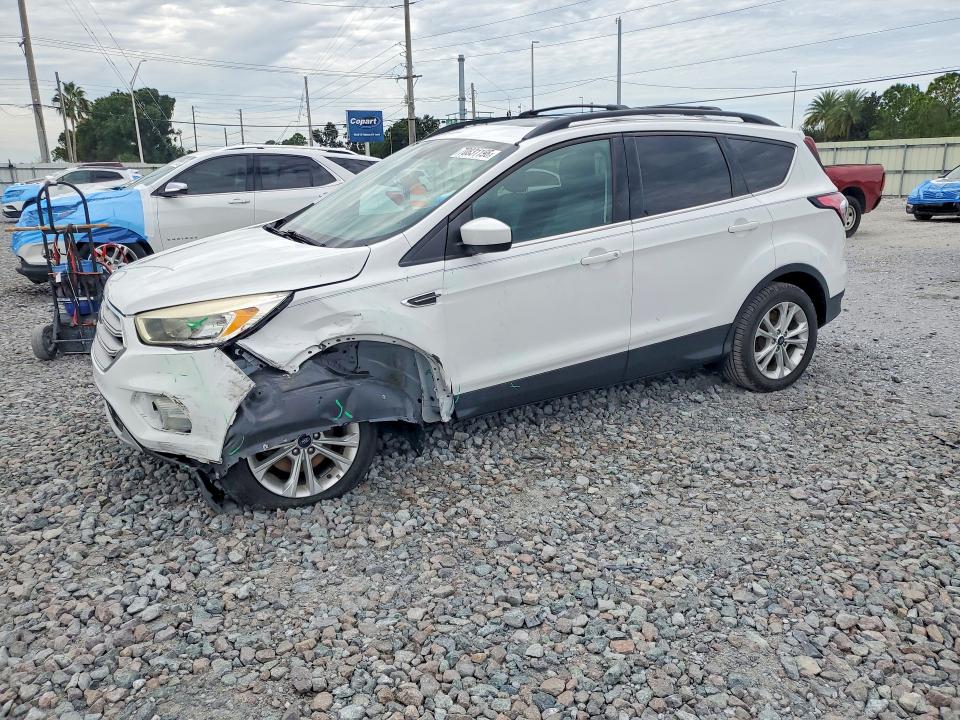 FORD ESCAPE 2018 with VIN 1FMCU0GD7JUA65590 - Photo from auction