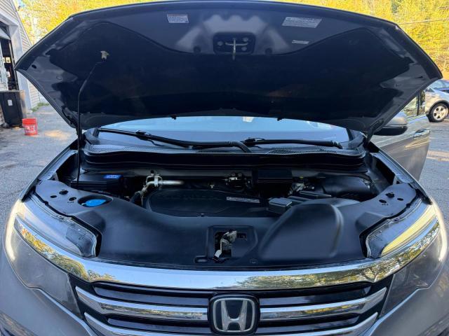 Снимка 7 от търг – 2016 HONDA PILOT с VIN 5FNYF6H07GB018189