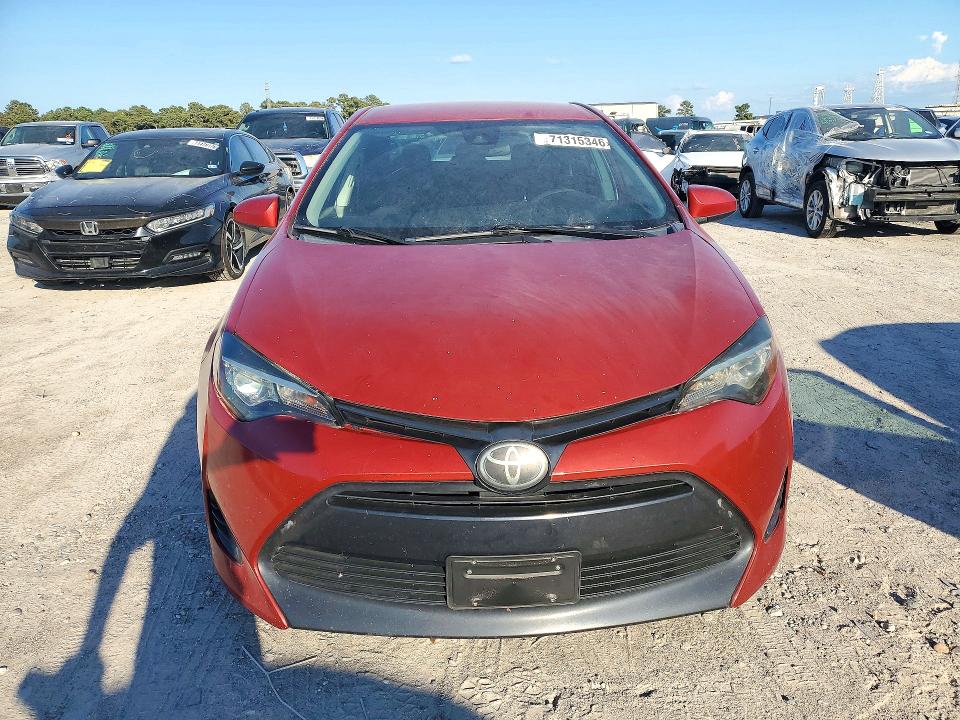 Снимка 5 от търг – 2018 TOYOTA COROLLA с VIN 5YFBURHE0JP804646