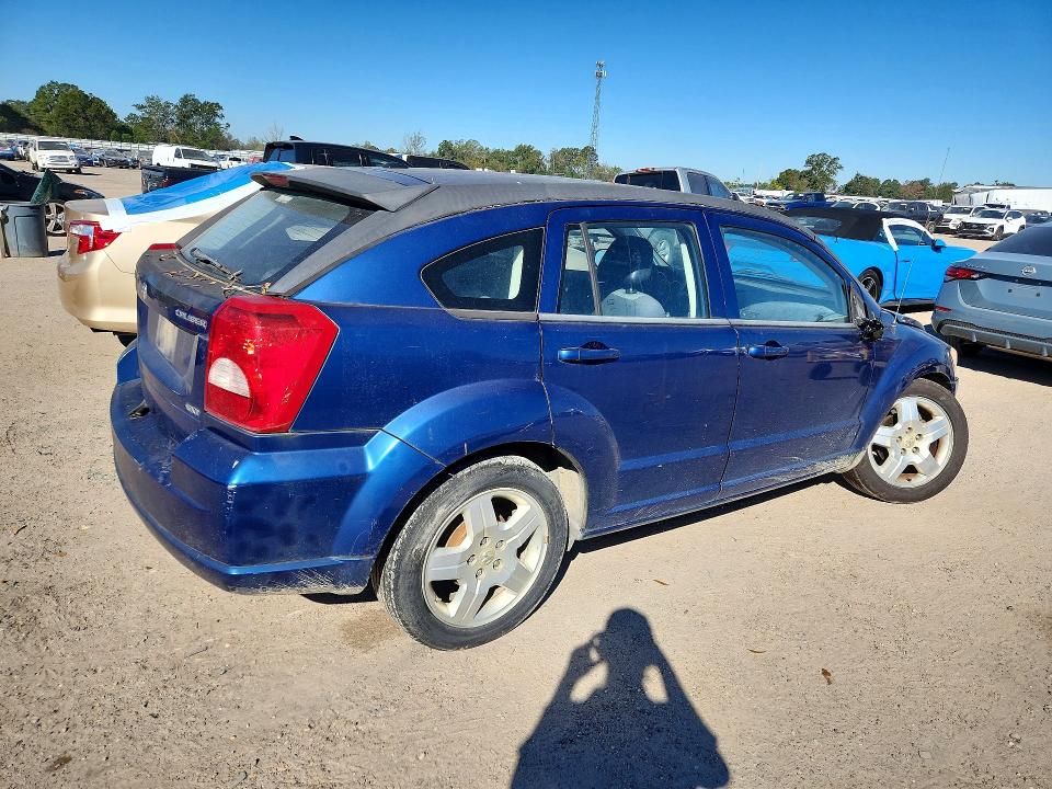 Снимка 3 от търг – 2009 DODGE CALIBER с VIN 1B3HB48A29D120634