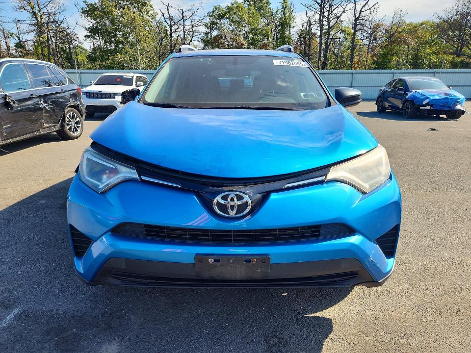 Photo 5 from auction – 2016 TOYOTA RAV4 with VIN JTMBFREV8GD184073