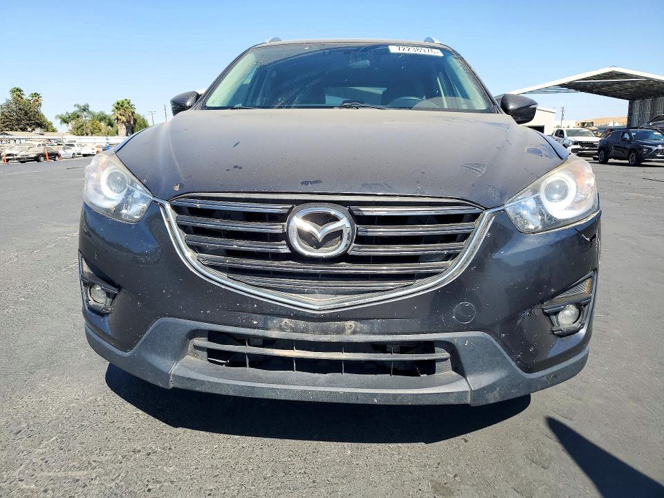 Снимка 5 от търг – 2016 MAZDA CX-5 с VIN JM3KE4DY2G0838808