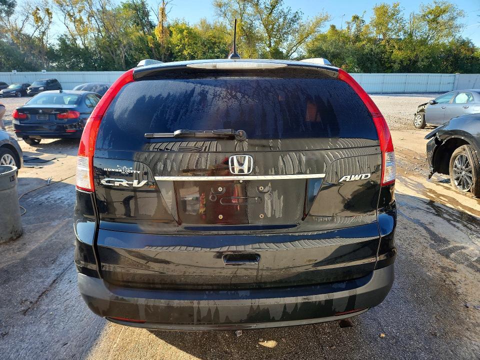 Photo 6 from auction – 2014 HONDA CR-V with VIN 2HKRM4H79EH625172