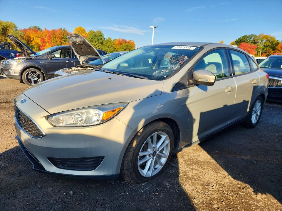 FORD FOCUS 2015 with VIN 1FADP3F22FL227288 - Photo from auction