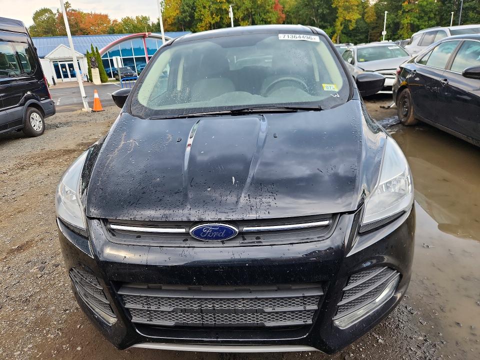 Photo 5 from auction – 2016 FORD ESCAPE with VIN 1FMCU0GX2GUA59294