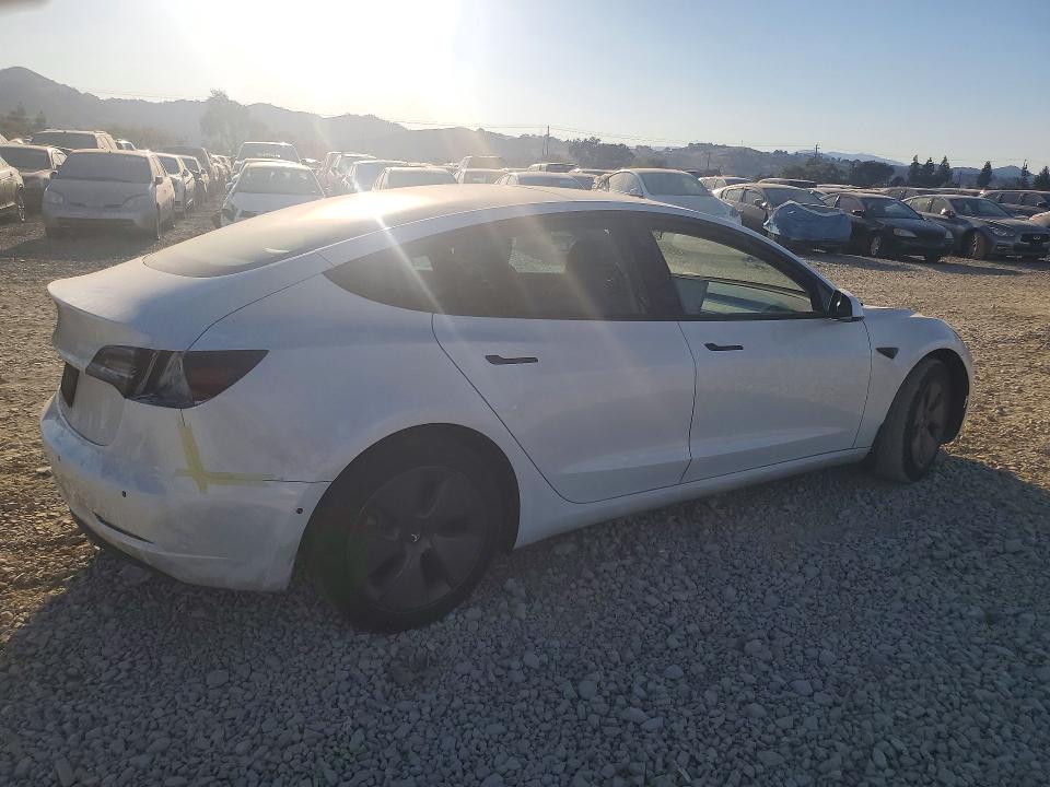 Снимка 3 от търг – 2022 TESLA MODEL 3 с VIN 5YJ3E1EA8NF196784