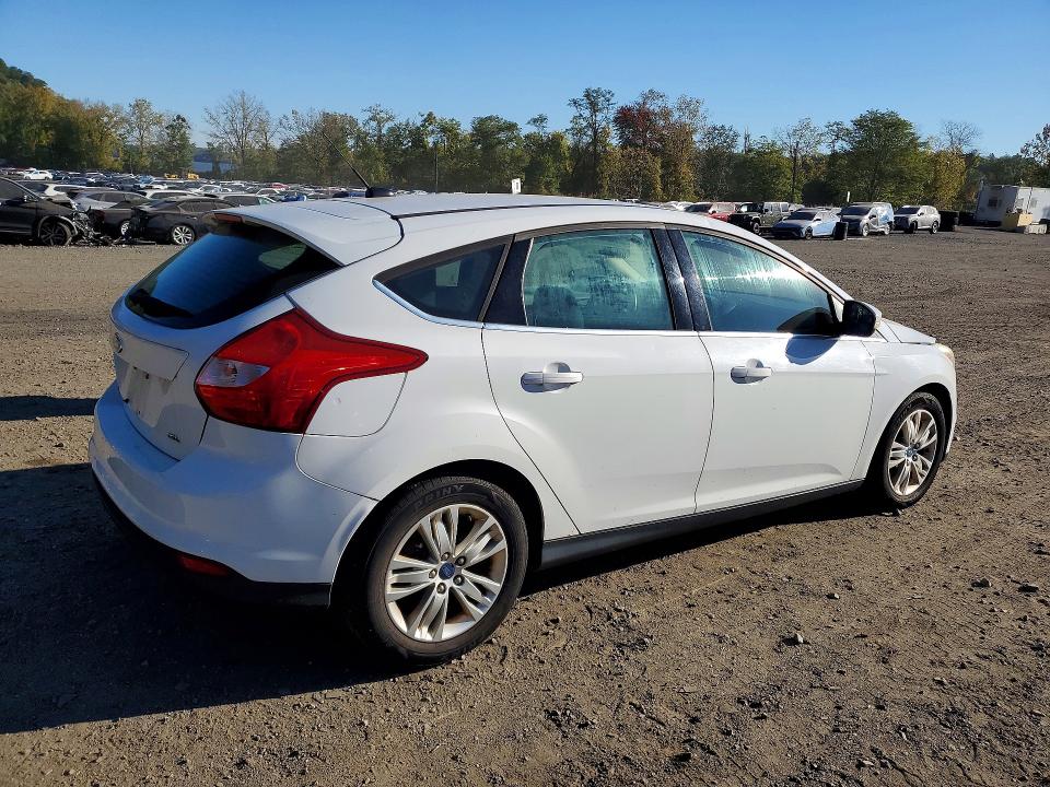 Foto 3 de la subasta – 2012 FORD FOCUS con VIN 1FAHP3M22CL196124