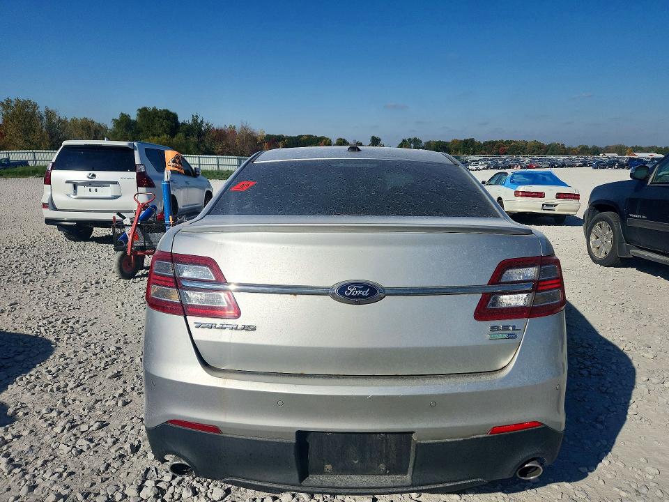 Снимка 6 от търг – 2013 FORD TAURUS с VIN 1FAHP2H84DG135019